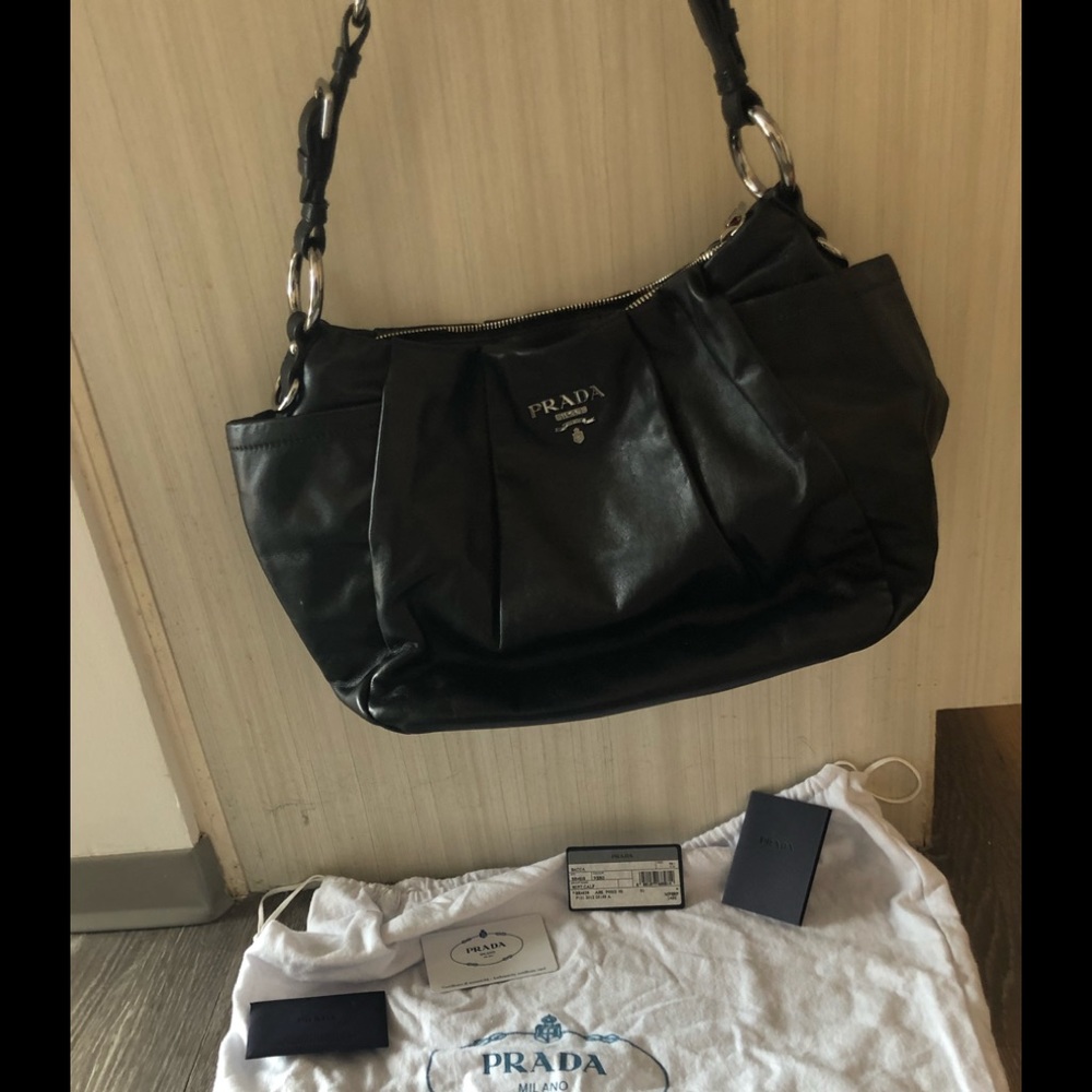 Prada black with silver. Excellent condition.